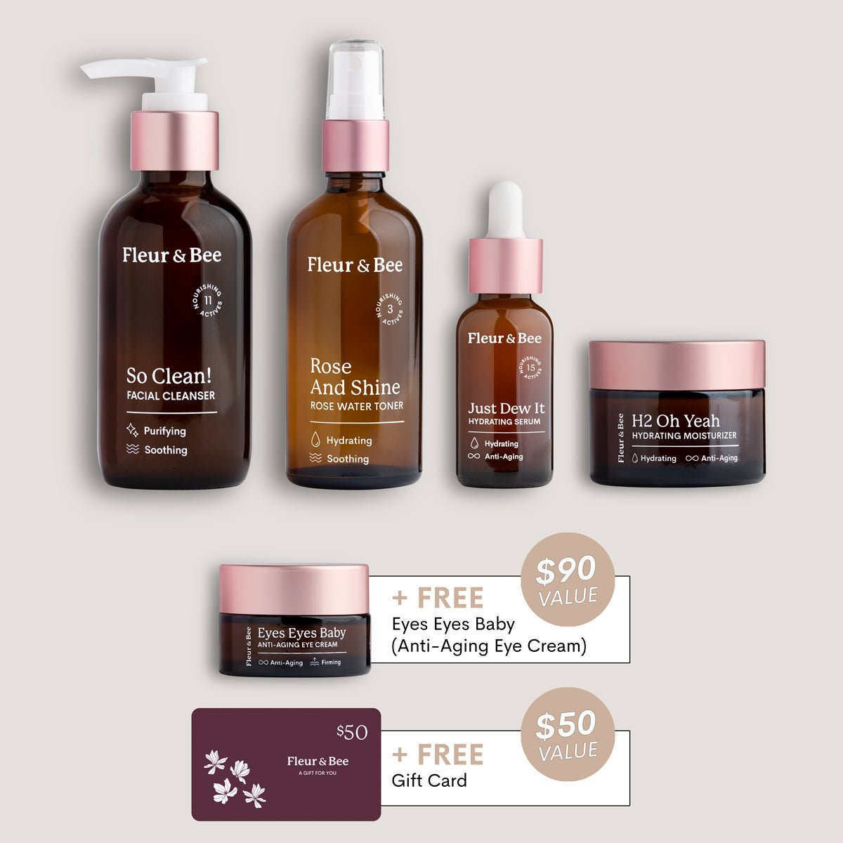 Fleur & Bee skincare product set with various bottles and a jar on a light gray background.