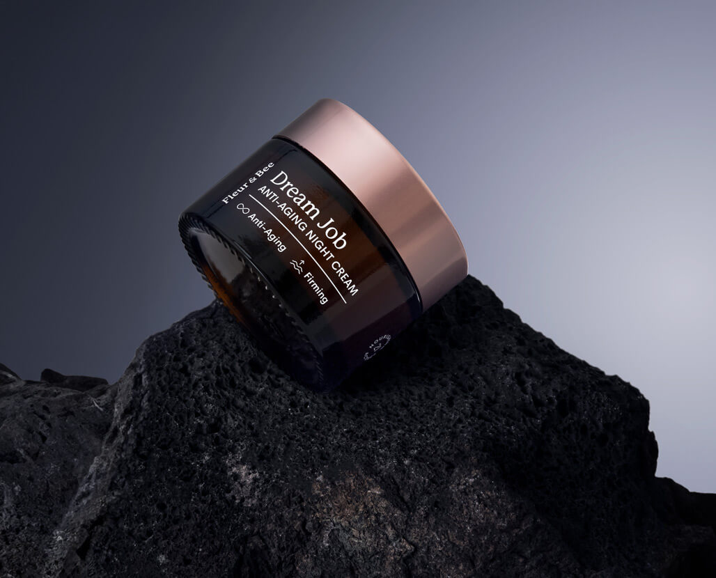 anti-aging night cream in a dramatic setting