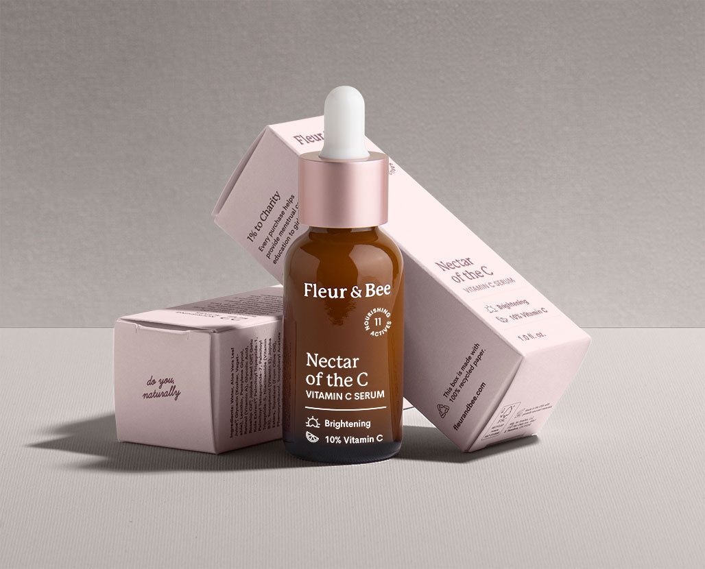 a luxe vitamin c serum surrounded by packaging